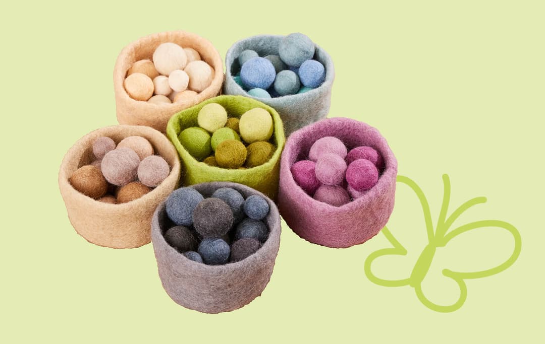 Vilten balletjes in een mand
